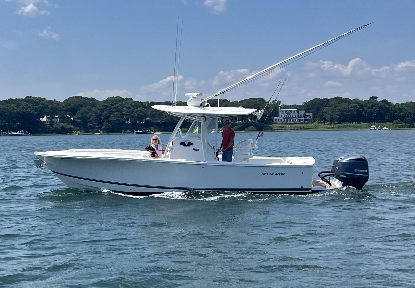 Captain Aidan Kelly steering the boat